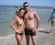 beach couple equally topless | Mamaia beach, Romania | c.2010 from ashley mason topless on beach